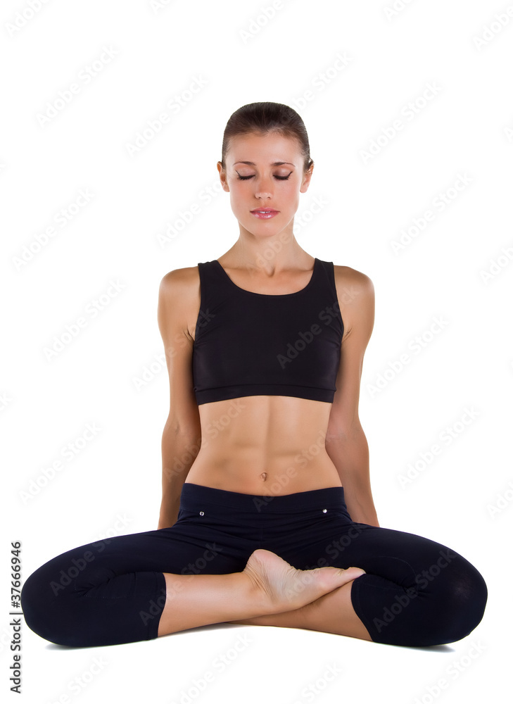 Young woman practices yoga