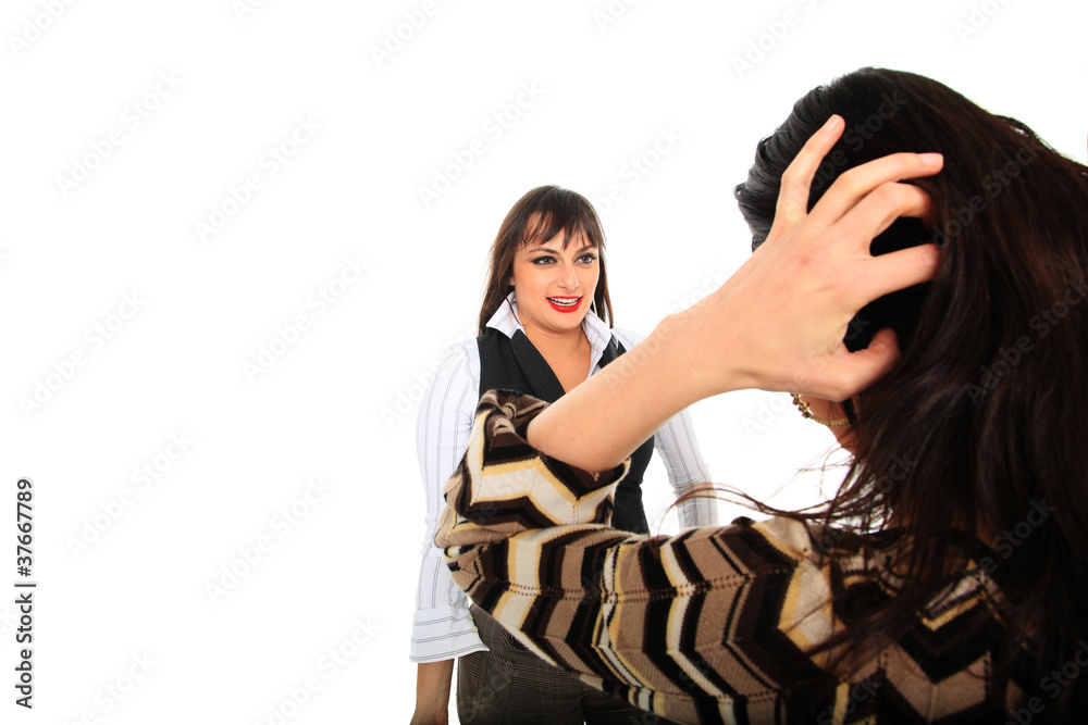 two happy young girlfriends talking