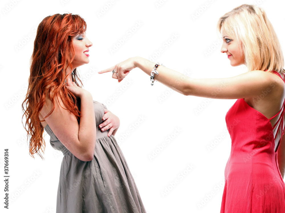 Two pretty women ginger with blonde in gowns on white Two pretty women ginger with blonde in gowns on white