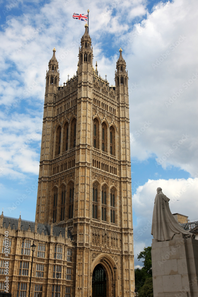 House of Parliament and statue George V in London, UK