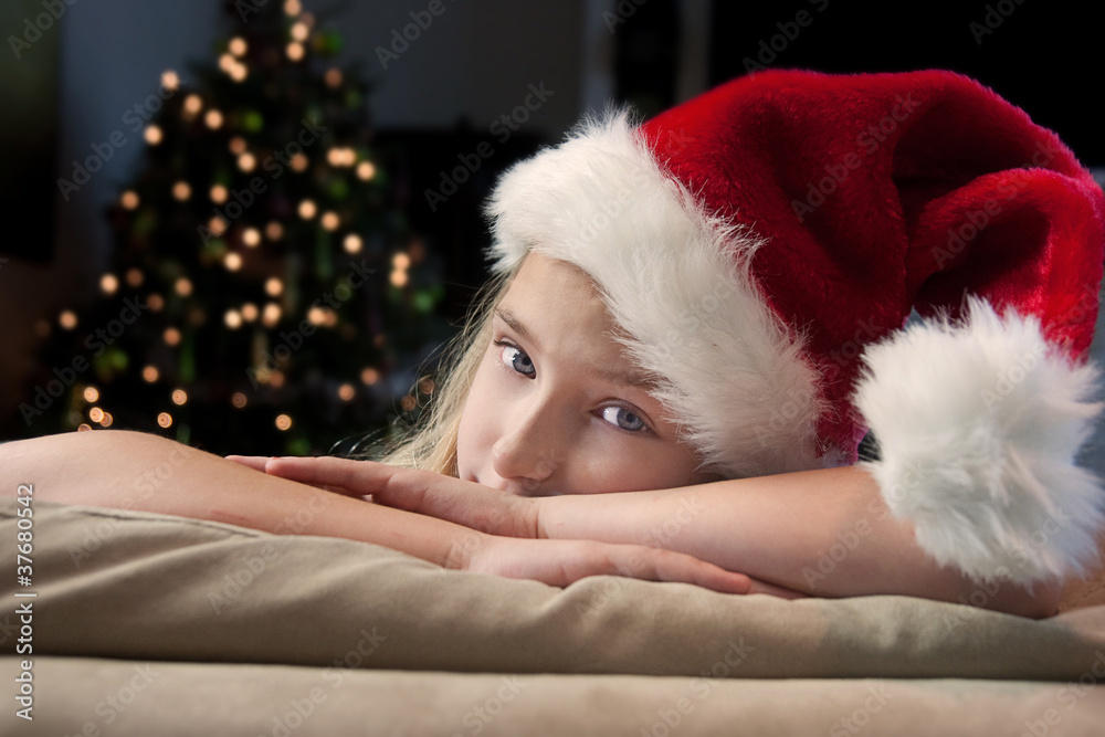 Young girl with Santa hat Young girl with Santa hat