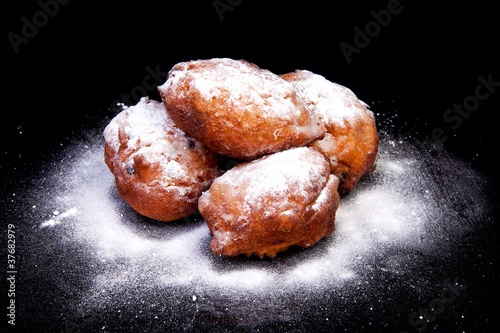 pile of Dutch donut also known as oliebollen photo