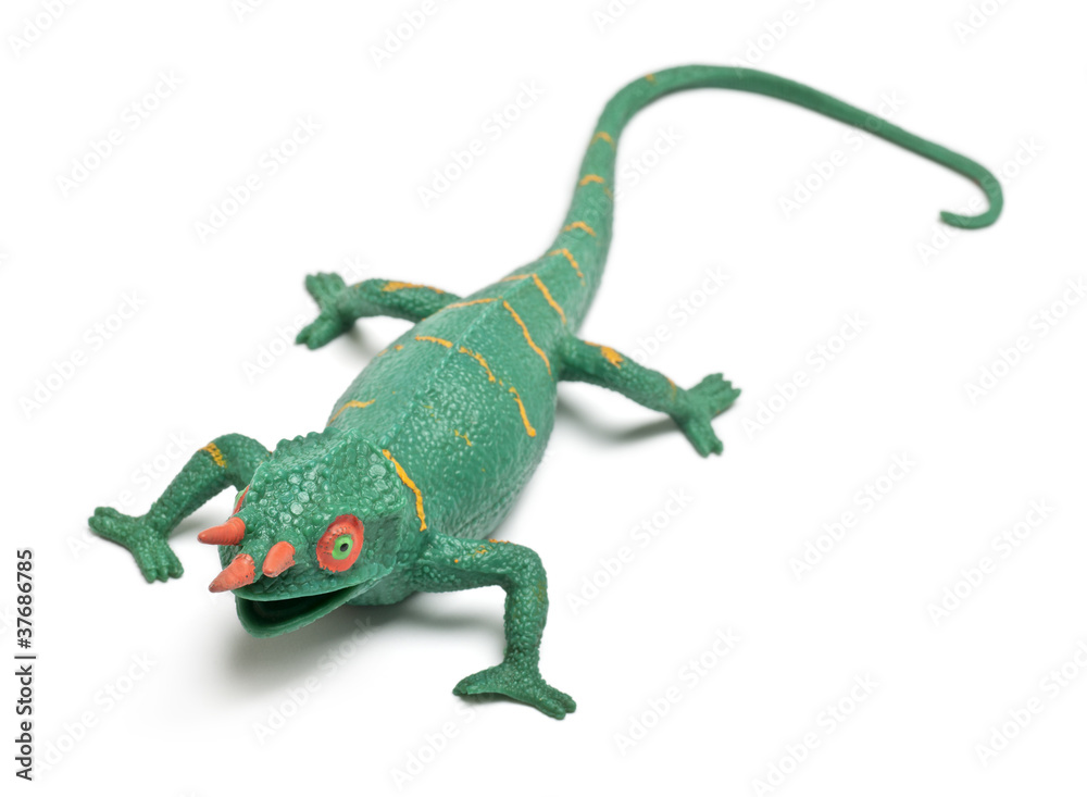 Fototapeta premium Chameleon toy in front of white background