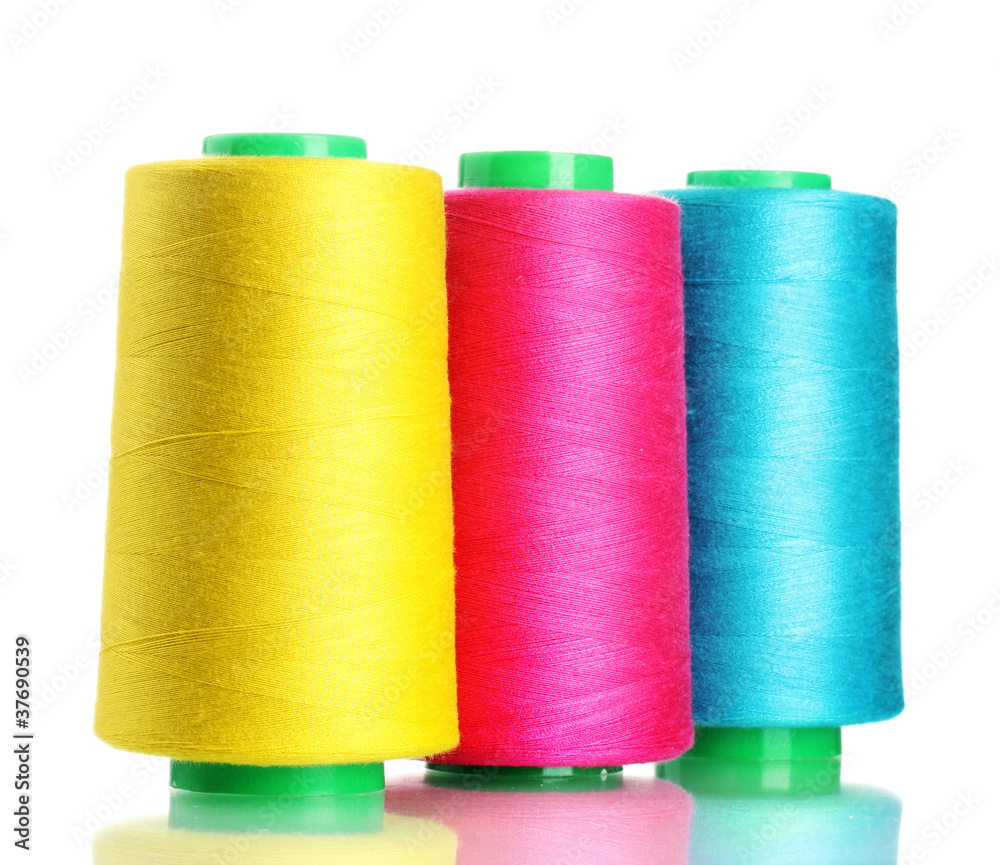 Bobbins of thread isolated on white Bobbins of thread isolated on white