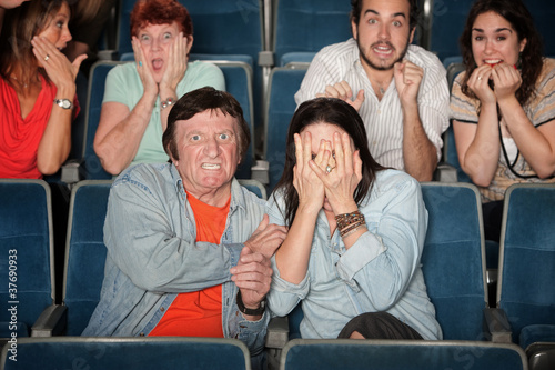 Scared People In Theater photo