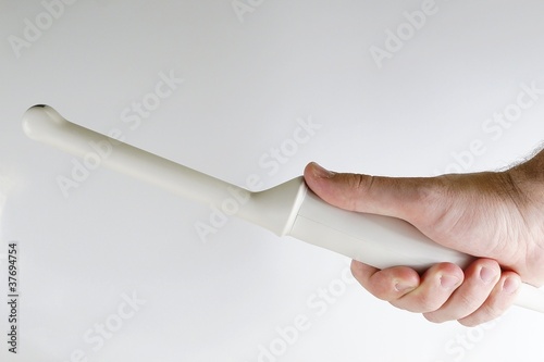 Vaginal endocavity ultrasound probe held in right hand