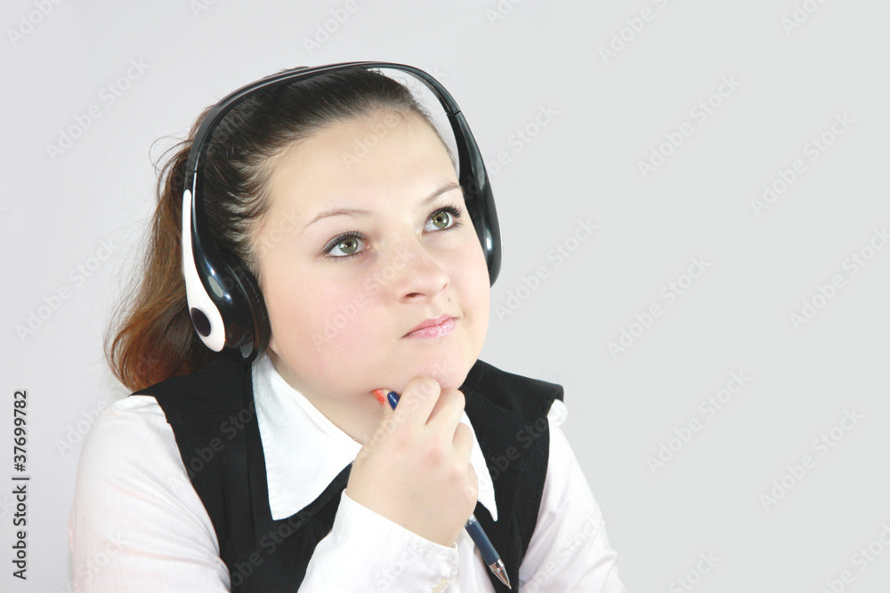 young girl manager on the headphones young girl manager on the headphones