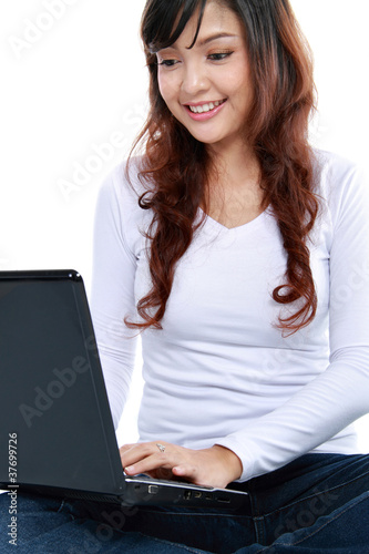 young casual holding laptop