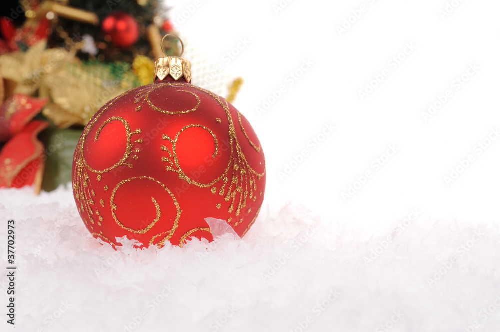 Red christmas ball with snow