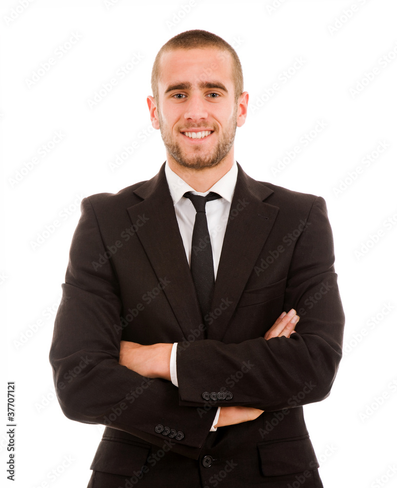 Successful young business man smiling against white background Successful young business man smiling against white background