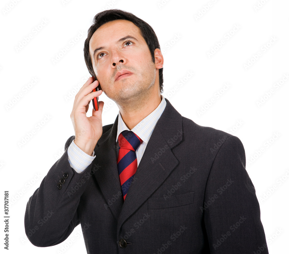 young business man talking on the phone, isolated on white young business man talking on the phone, isolated on white