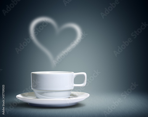 Coffee cup with heart shaped white smoke