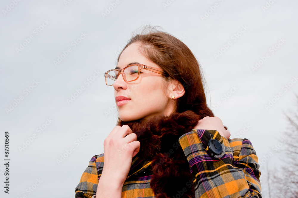 woman with glasses on a white background