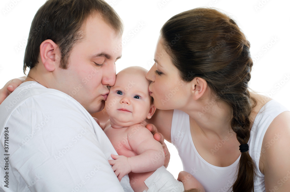 Portrait of a young happy family with the kid Portrait of a young happy family with the kid