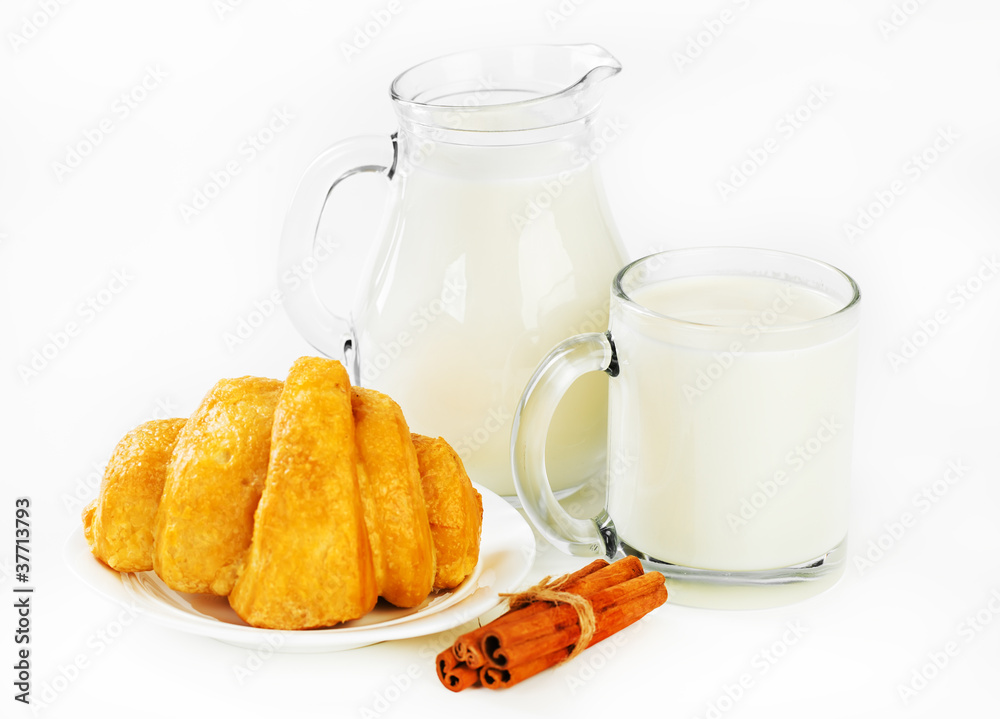 Milk in a cup with croissants Milk in a cup with croissants