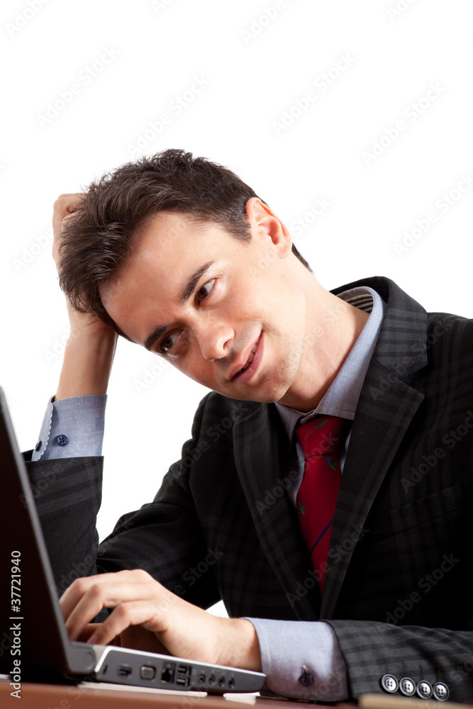 Stressed businessman at laptop