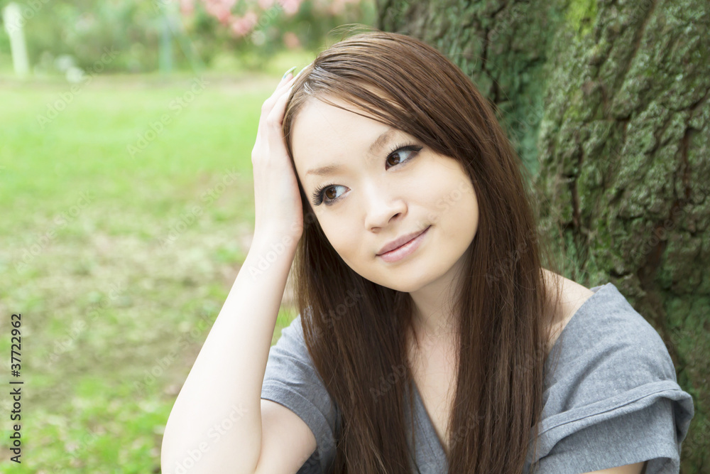 Beautiful young woman in the forest