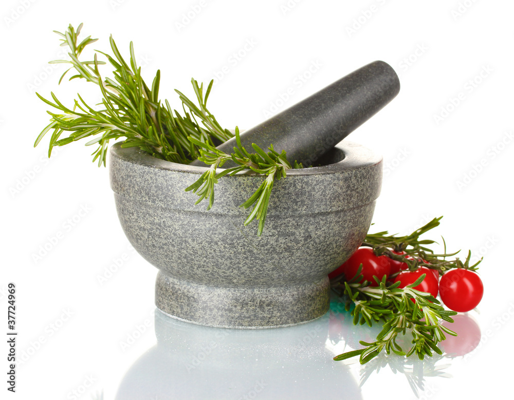 fresh green rosemary in mortar and tomatoes cherry isolated