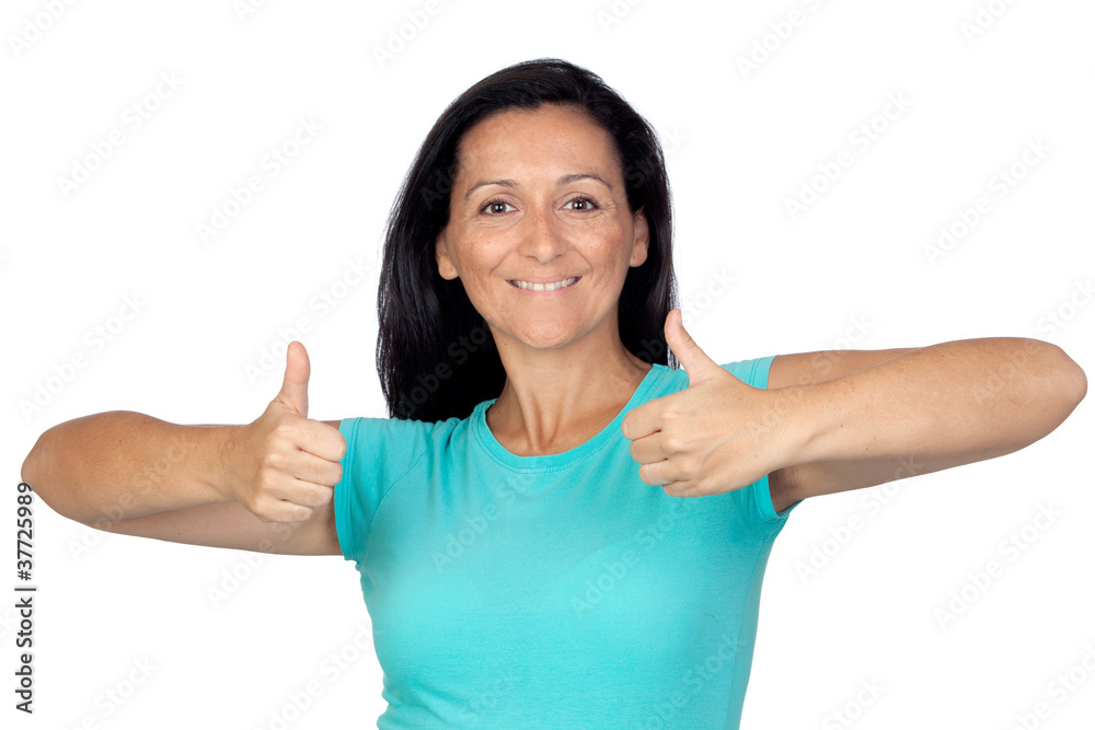 Adorable woman with blue t-shirt saying Ok Adorable woman with blue t-shirt saying Ok