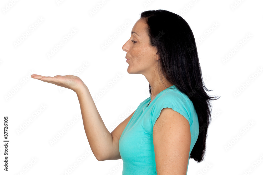 Adorable woman withÊextendedÊpalm blowing something Adorable woman withÊextendedÊpalm blowing something