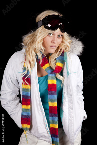 Woman white coat scarf serious
