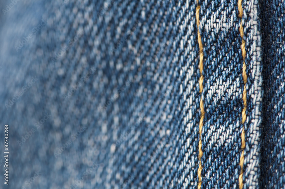 Orange stitch on the denim garment Orange stitch on the denim garment
