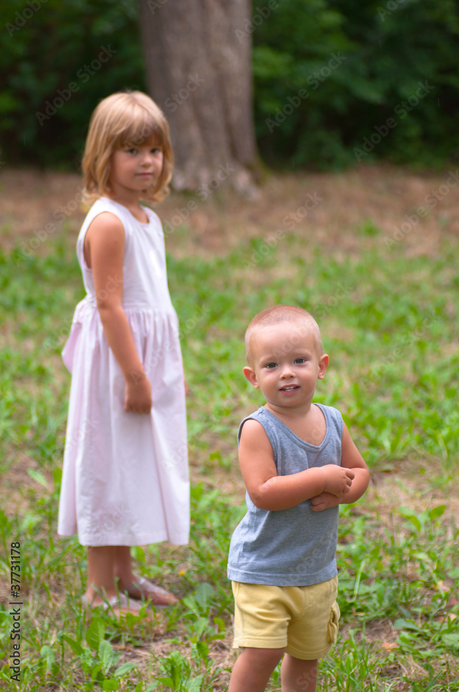 Sister and brother enjoying beautiful summer day Sister and brother enjoying beautiful summer day