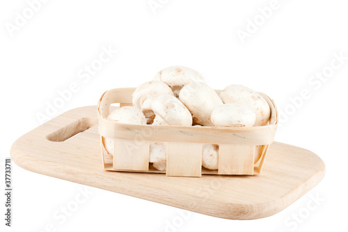 Fresh mushrooms in a wooden box