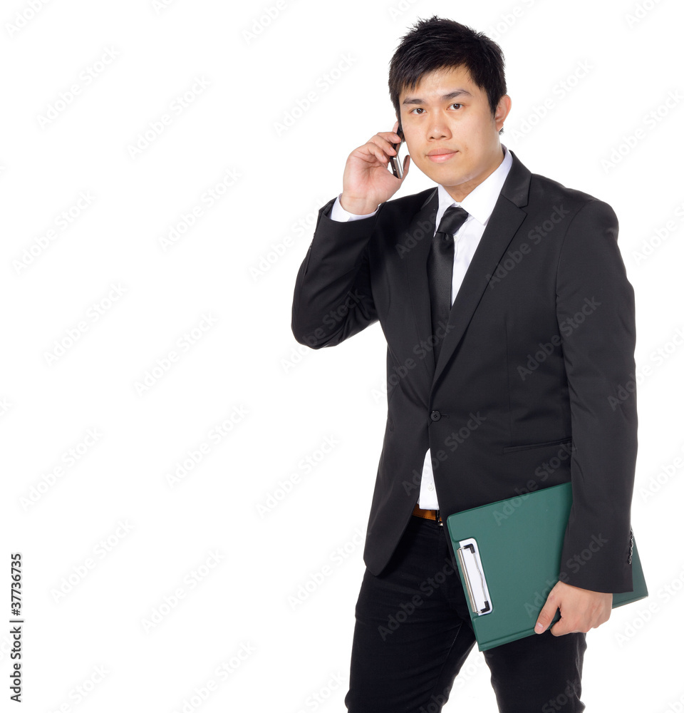 young asian business man with file and phone young asian business man with file and phone