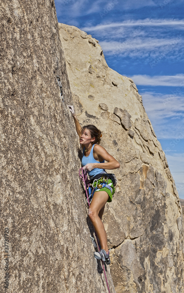 Climber gripping the rock.