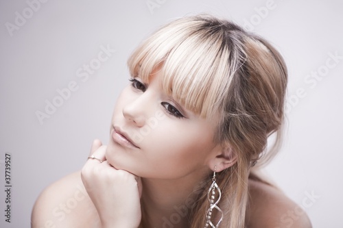 beautiful pensive young blond girl