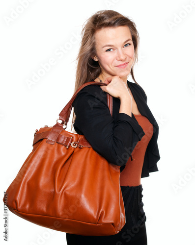 Young smiling woman with handbag