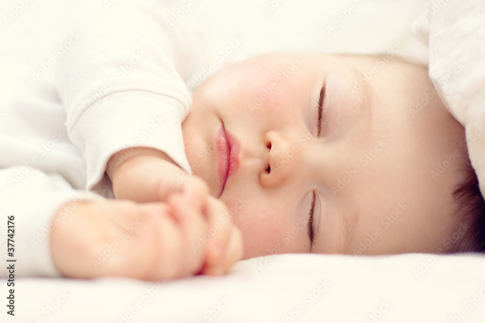 close-up portrait of a beautiful sleeping baby on white close-up portrait of a beautiful sleeping baby on white