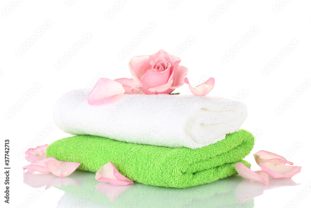 Towel and flower isolated on white Towel and flower isolated on white