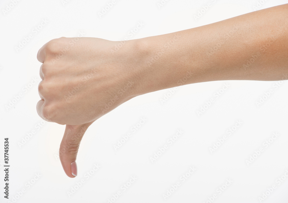 female hand thumb down, isolated on white background female hand thumb down, isolated on white background