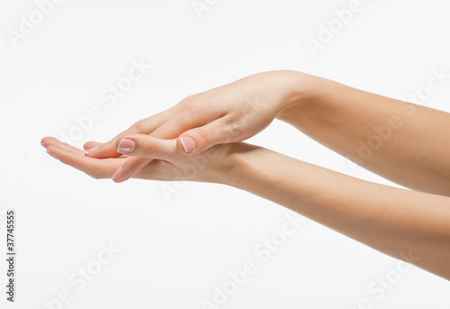 Beautiful female hands, isolated on white background