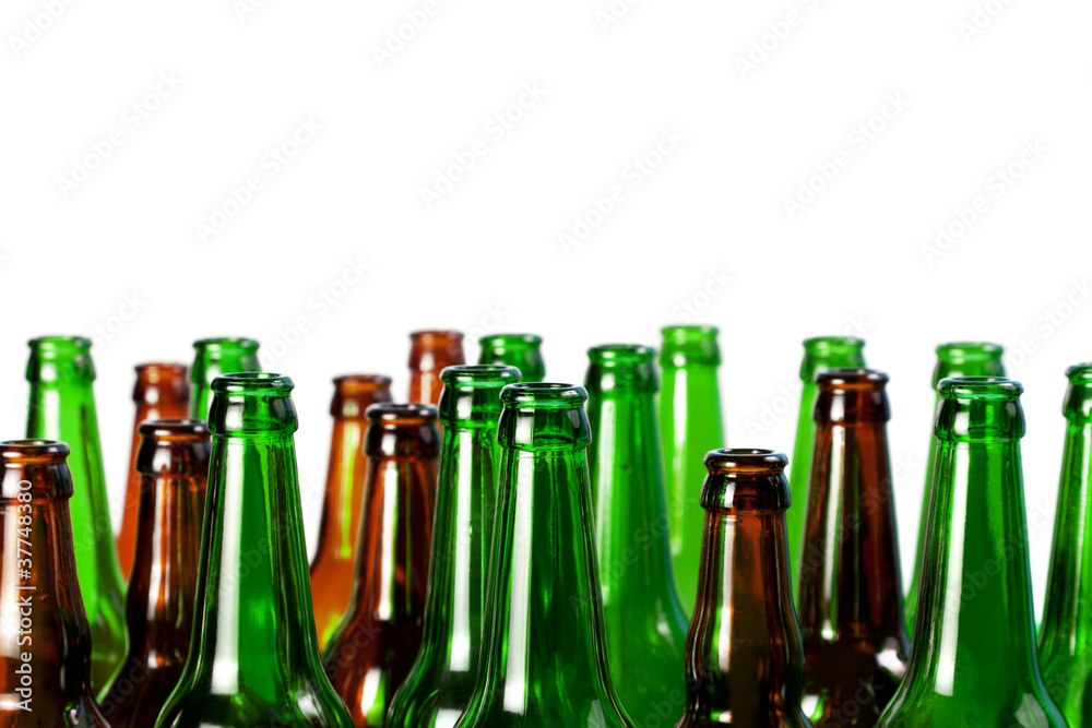 Beer bottles of green glass and a brown Beer bottles of green glass and a brown