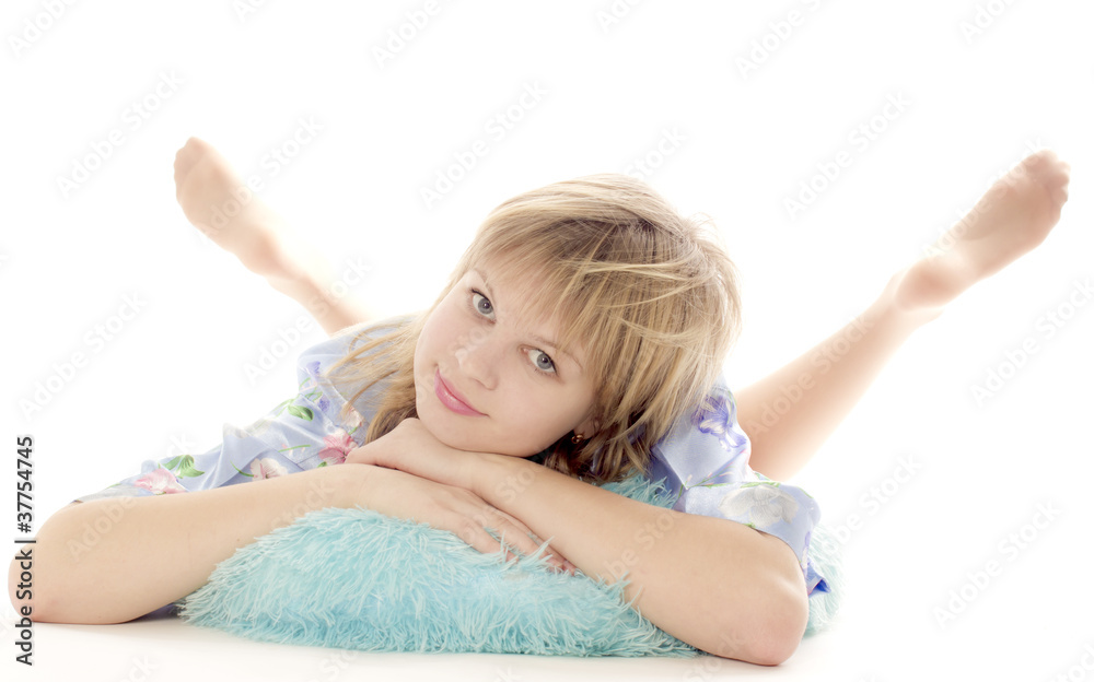 Portrait of the girl lying on a pillow
