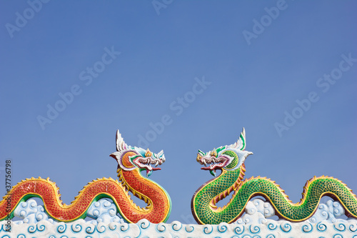 two dragon in blue sky