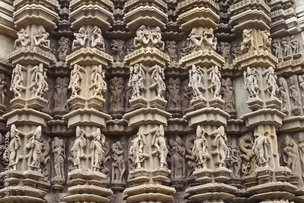 Detail of carving on a temple in Khajuraho, India. Detail of carving on a temple in Khajuraho, India.