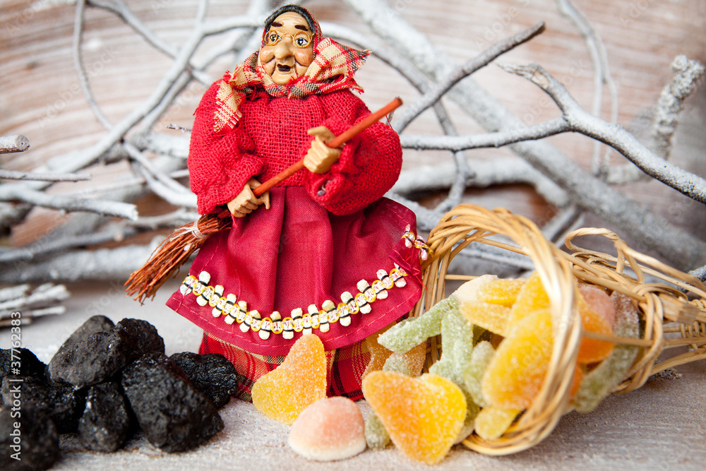 Befana con caramelle e carbone Stock Photo | Adobe Stock