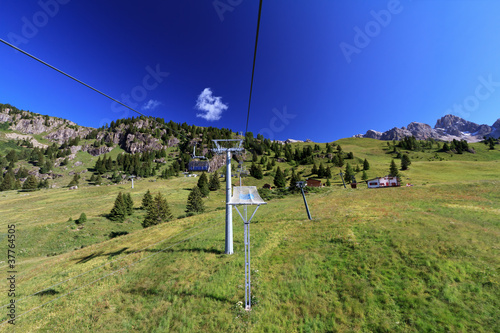 Seggiovia - chairlift in Dolomites photo