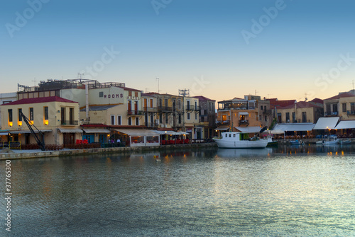 Sunset over the Venetian Harbour at Rethymno Crete Greece photo