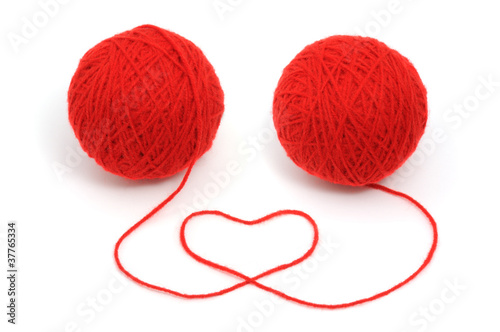 Red yarn with heart symbol