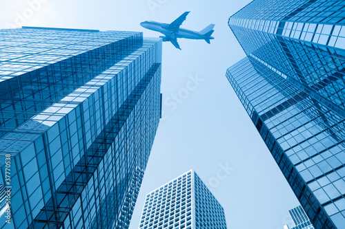 airplane with modern building