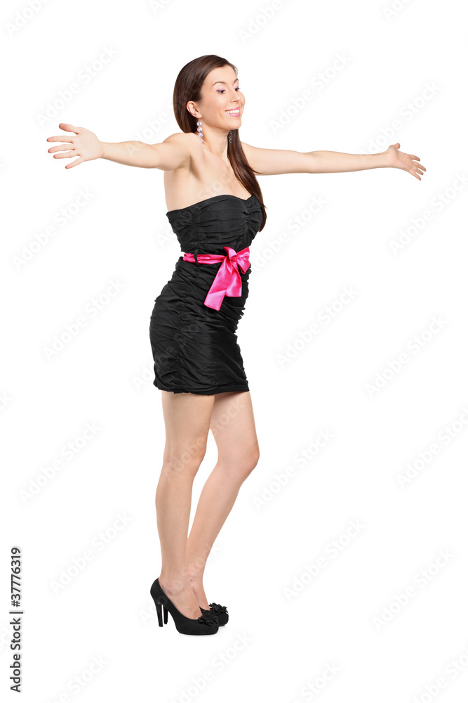 Full length portrait of a surprised young woman with hands wide Full length portrait of a surprised young woman with hands wide