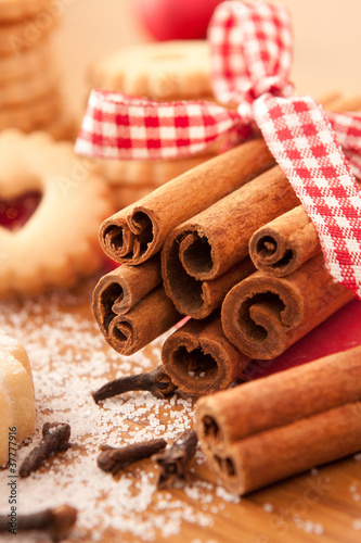 Cinnamon sticks with Christmas cookies