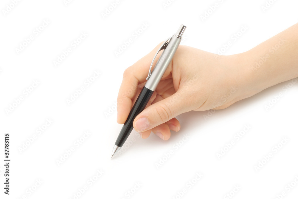 Writing woman hand on a white background Writing woman hand on a white background
