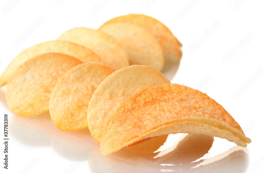 Delicious potato chips isolated on white