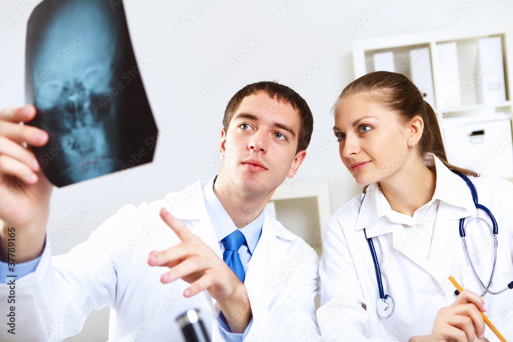 Young doctors at work Young doctors at work